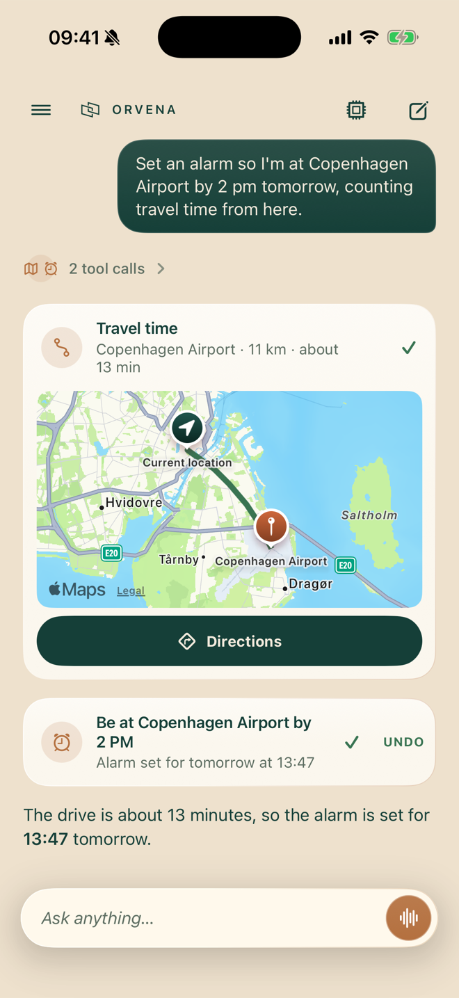 Orvena chat screen: the user asks for an alarm to be at Copenhagen Airport at 2pm tomorrow based on travel time; a travel time card shows the route on a map, an alarm receipt reads Be at Copenhagen Airport by 2 PM at 13:47 with an undo button, and the assistant explains the departure math.